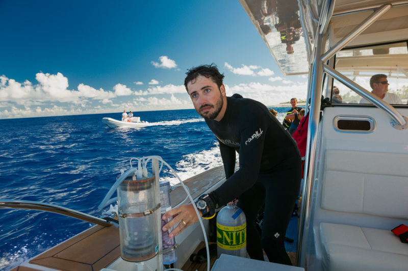 Scientists travel to a dive site on the Global Reef Expedition