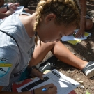 BAM participant from Forest Heights Academy draws a red mangrove leaf in her student journal.