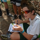 Forest Heights Academy student draws a black mangrove leaf and labels the salt and fine hairs on the leaf.