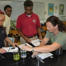 Our Director of Education, Amy Heemsoth shows students how to test the pH of various types of liquids.