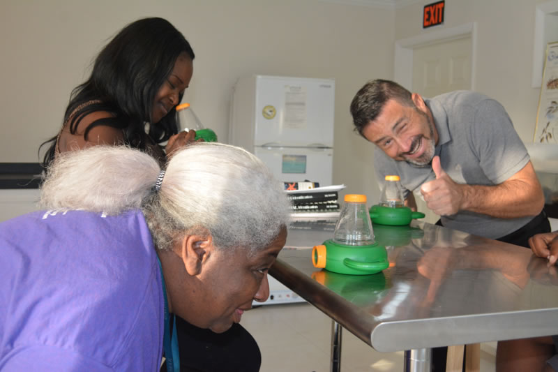 Teachers from Abaco Central High School and Forest Heights Academy enjoy identifying marine animals during professional development training at FRIENDS Kenyon Center Lab.