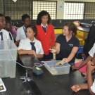 Amy Heemsoth, our Director of Education, shows students at Abaco Central High School how chitons are able to attach themselves to rocks.
