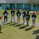 Students at Forest Heights Academy form a mangrove food web.