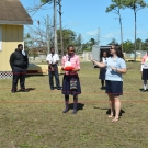 Director of Education, Amy Heemsoth instructs students at Abaco Central High School about how energy in the food chain begins with the sun.