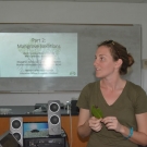 Ryann Rossi, PhD Candidate at North Carolina State University explains to Forest Heights Academy students how they will isolate the potentially diseased lesions on their leaves.