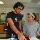 Students at Forest Heights Academy sterilize their tools before isolating the diseased portion of their mangrove leaves. Students will grow these isolations in agar plates to see if there is fungal growth present, which could indicate that the mangroves are diseased.