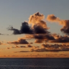 Panoramic sunset over the Three Brothers Islands on the western edge of the Great Chagos Bank.