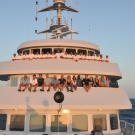 The Science Team and Crew on the Golden Shadow at sunset.