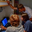 Andrew Bruckner, Jeremy Kerr, and Brian Beck study data collected.