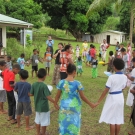 Living Oceans Foundation Education Director Amy Heemsoth leads a group of Fijan school children in a lesson on classification.