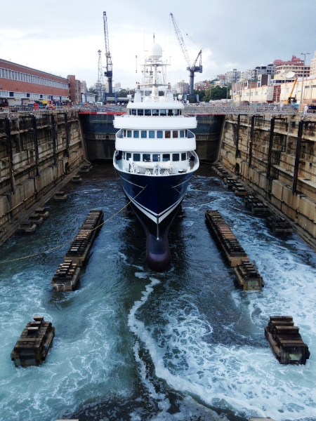 The floating process in carried out in stages. At each stage, inspections inside the vessel are completed to ensure all of the hull valves are holding and that there are no leaks. Once the Chief Engineer has reported everything is satisfactory, they continue to flood the basin until Shadow floats. Mooring ropes attached to the dock sides keeps the vessel in position. The whole process takes about 3hrs before the water is at the same level as the water in Sydney harbor.