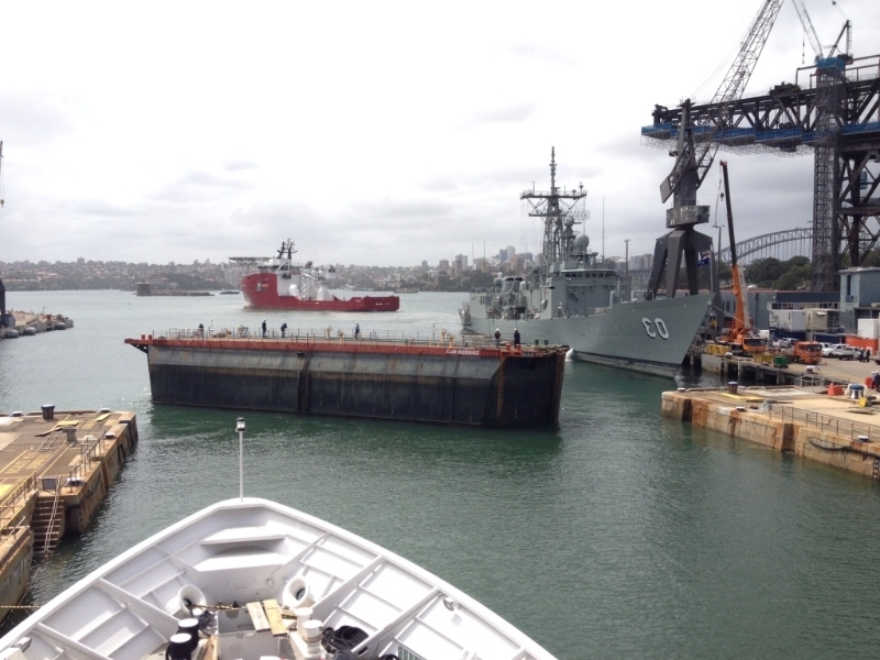 Tugs tow the Caisson away and the dock is now open to Sydney harbor.
