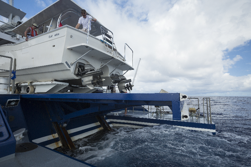 Deploying dive vessel, Calcutta, from M/Y Golden Shadow.