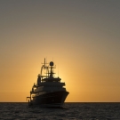 The Golden Shadow at sunset, the mothership of the Living Oceans Foundation. The ship is owned by His Royal Highness Prince Khaled bin Sultan.