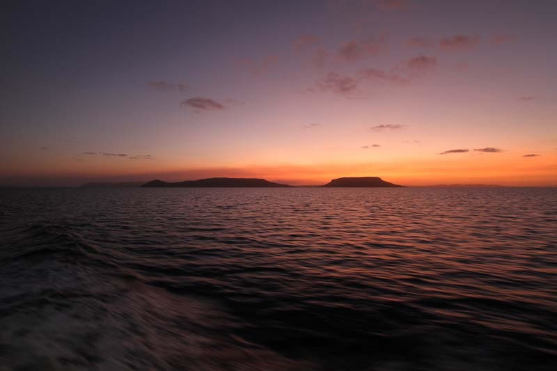 Sunset over the Great Barrier Reef at the end of a long survey day.