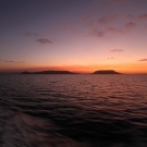 Sunset over the Great Barrier Reef at the end of a long survey day.