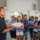 Dr. Andrew Bruckner showing coral to Polynesian students.