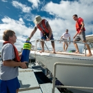 Dr. Andrew Bruckner, the science team and staff load SCUBA equipment onto the Calcutta.