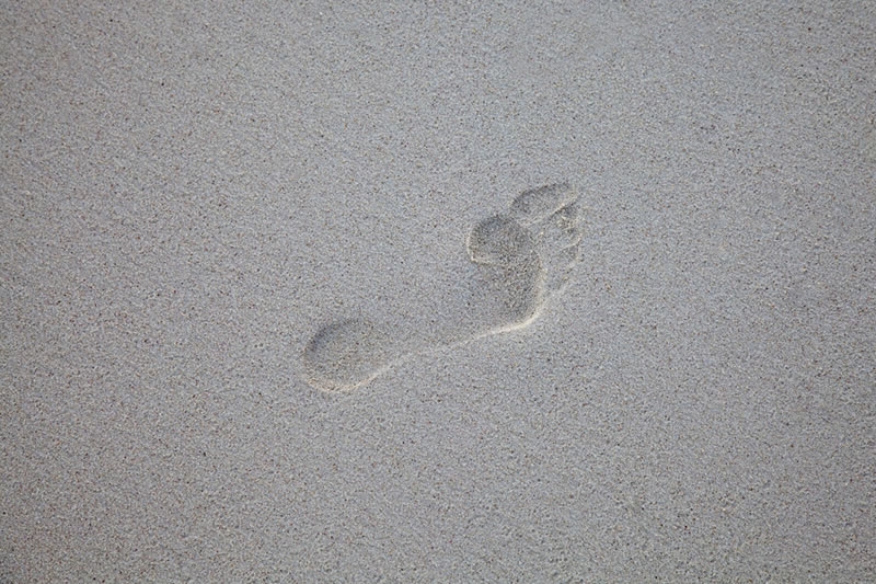Not Robinson Crusoe but a footprint on a pristine section of the beach.