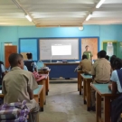 Director of Education, Amy Heemsoth, teaching Holland High School students how to graph their mangrove propagule growth data.