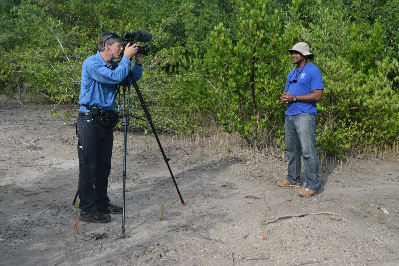 Videographer Art Binkowski films an interview with Scientific Officer, Camilo Trench from the University of the West Indies Discovery Bay Marine Lab.