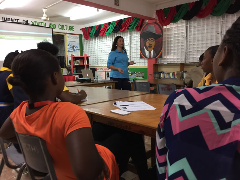 Director of Education, Amy Heemsoth teachers students at Marcus Garvey about the three main adaptations of mangroves: reproduction, anaerobic sediment, and living in salt water.