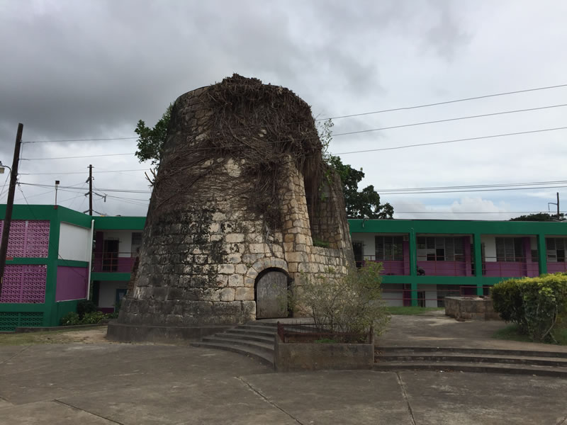 An old windmill still stands at William Knibb High School to remind students of a time when slavery was a part of their culture and how William Knibb helped to free slaves.
