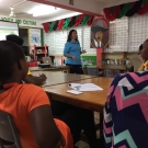 Director of Education, Amy Heemsoth teachers students at Marcus Garvey about the three main adaptations of mangroves: reproduction, anaerobic sediment, and living in salt water.