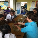 Amy Heemsoth, Director of Education discusses the role of sea stars in a mangrove ecosystem at William Knibb High School.