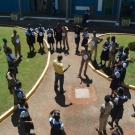 Discovery Bay Marine Lab Chief Scientist, Camilo Trench, provides instructions for the food web activity explaining that each person represents a different organism in the mangrove food web.