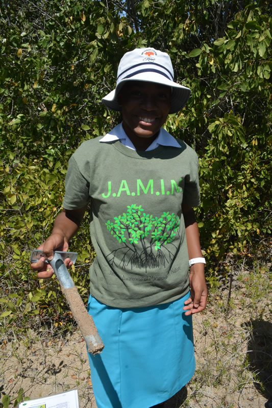 Collecting soil samples when the ground is hard and dry is a tough task; however, this student from William Knibb High School managed to collect a large sample.