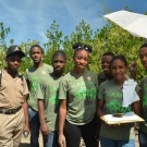 Although it is hot, students at William Knibb High School are determined to collect the data that they need to monitor their mangroves.