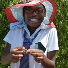 This student was so excited to hold a crab for the first time.