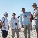 Daniel Pauly, Martin Visbeck, and Robbert Cassier speak with a Galápagos park guide. (© Andreas Krueger/UNESCO)