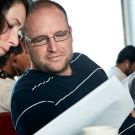 Alison Barrat talks to Dr. Stephen Box. (© Andreas Krueger/UNESCO)