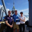 Captain Philip G. Renaud, Executive Director of the Khaled bin Sultan Living Ocean Foundation, Dr. Fanny Douvere of the UNESCO World Heritage Center, and Oliver Steeds, NEKTON Deep Ocean Exploration Mission Director showcase the UNESCO & IUCN report \"World Heritage in the High Seas: An Idea Whose Time has Come.\"