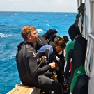 Member of the research team prepare for a dive.