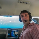 Sam Purkis during an aerial survey.