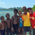 Boys near Seghe town stop for a quick photo opportunity.