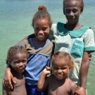 Family posing for a photo together.