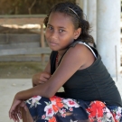 Young girl waiting for the education program in Kia Village. 