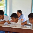 St. Peter Chanel students concentrating hard while taking coral reef survey.