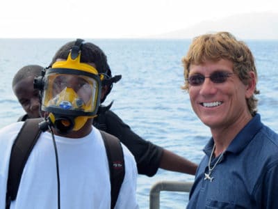 A student from the Young Council on Nevis had a laugh trying on the full face mask