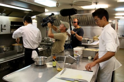 Chefs hard at work in the galley are filmed for the video tour of the Golden Shadow