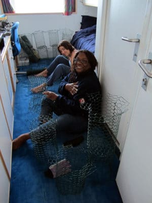 Dr. Sonia Bejarano (Living Oceans Fellow) and Indira Brown of the Bahamas Department of Marine Resources build fish exclusion cages