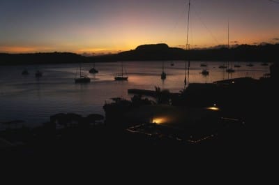 The sun rising over Port of Refuge Harbor, Vava’u, Tonga.