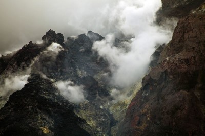 Steamy summit of Tinakula active volcano at Solomon Islands.