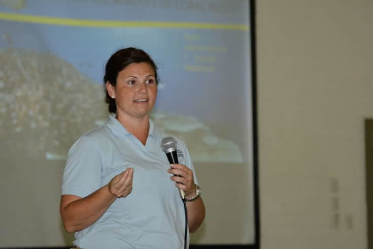 Amy Heemsoth presenting Tongan coral reef education seminars in local schools