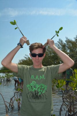 Students in the Year 1 B.A.M. and J.A.M.I.N. programs plant their mangrove seedlings.