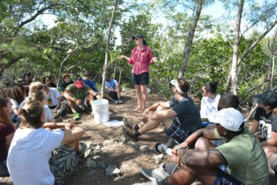 Ryann Rossi, PhD Candidate at North Carolina State University teaches students in the B.A.M. program about mangrove disease.